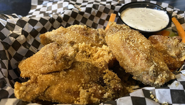 Chicken wings dusted in dry rub at Toley's on the Creek restaurant and bar in Centennial, CO