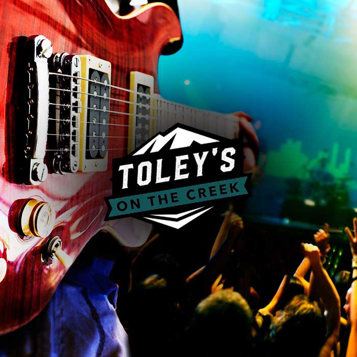 Live music band crowd and guitar at Toley's on the Creek